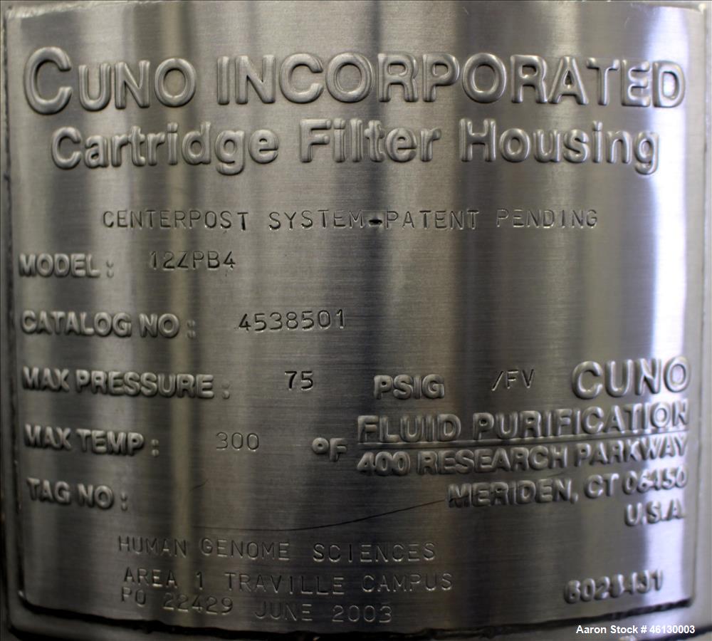 Used Cuno Dual Filter Skid, Model 12ZPB4, 316L Stainless Steel. (2) Cartridge filter housings, no filters, approximately 12-1/2" diameter x 47" straight side. Internal rated 75 psi/full vacuum at -20...