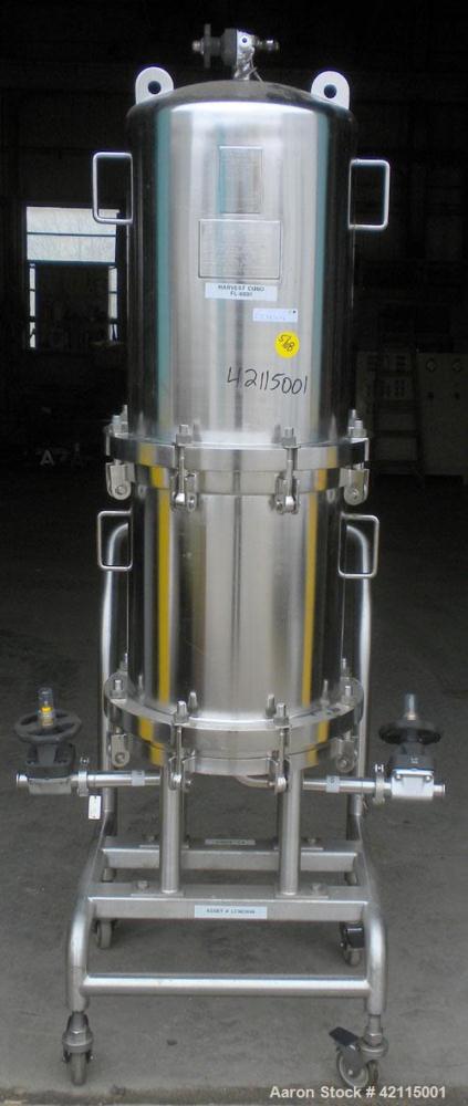 Used Cuno Cartridge Filter, Model 21ZWB4, 316L stainless steel, vertical. Approximately 280 square feet filter area. 17-3/4" diameter x 47-3/4" deep. Provision for 21 cartridges. Internal rated 75/-1...