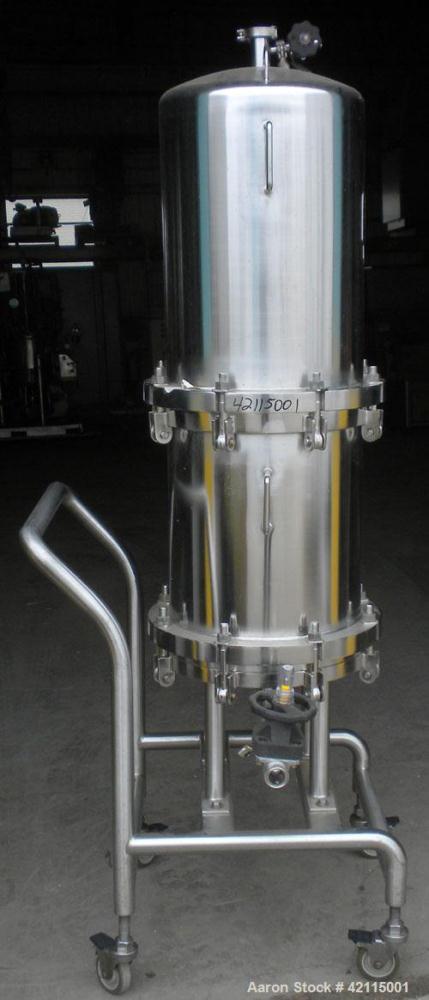 Used Cuno Cartridge Filter, Model 21ZWB4, 316L stainless steel, vertical. Approximately 280 square feet filter area. 17-3/4" diameter x 47-3/4" deep. Provision for 21 cartridges. Internal rated 75/-1...