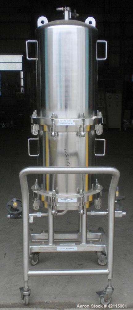 Used Cuno Cartridge Filter, Model 21ZWB4, 316L stainless steel, vertical. Approximately 280 square feet filter area. 17-3/4" diameter x 47-3/4" deep. Provision for 21 cartridges. Internal rated 75/-1...