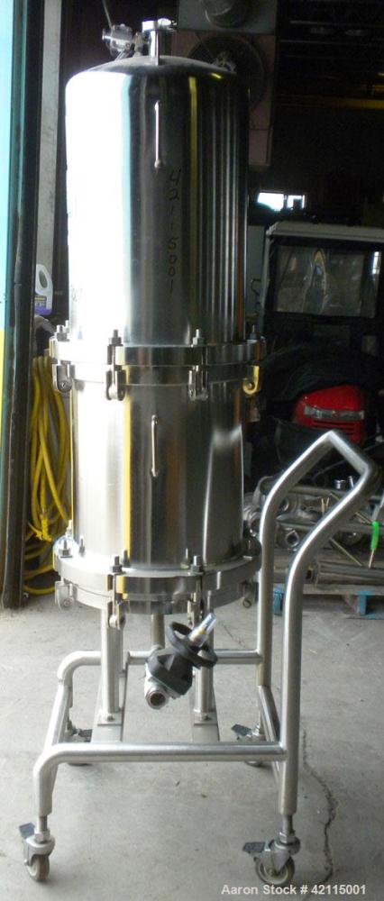 Used Cuno Cartridge Filter, Model 21ZWB4, 316L stainless steel, vertical. Approximately 280 square feet filter area. 17-3/4" diameter x 47-3/4" deep. Provision for 21 cartridges. Internal rated 75/-1...