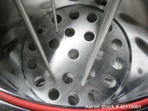 Used Cuno Cartridge Filter, Model 21ZWB4, 316L stainless steel, vertical. Approximately 280 square feet filter area. 17-3/4" diameter x 47-3/4" deep. Provision for 21 cartridges. Internal rated 75/-1...
