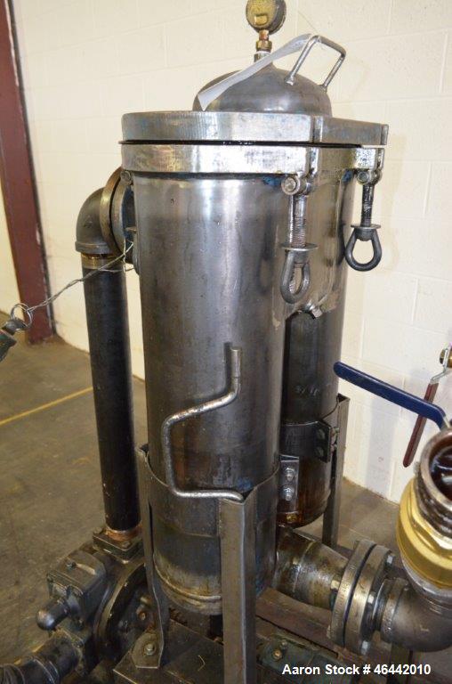 Used FSI Filter Specialists Double-Barreled Bag Filter, Model FSP-250, Carbon steel. Approximate 8.8 square feet surface area, maximum flow rate 150 gallons per minute. Each chamber approximate 8" di...