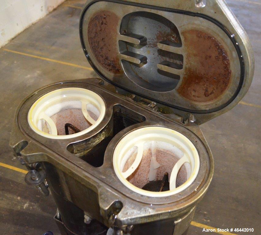 Used FSI Filter Specialists Double-Barreled Bag Filter, Model FSP-250, Carbon steel. Approximate 8.8 square feet surface area, maximum flow rate 150 gallons per minute. Each chamber approximate 8" di...