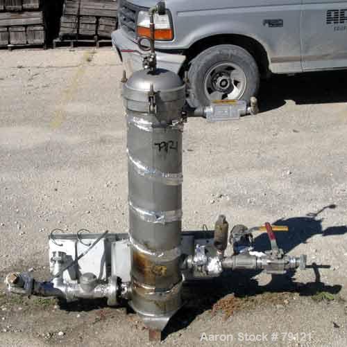USED: Filterite cartridge filter, model 18FM03A-2, 304 stainless steel. 8-1/4" diameter x 37" straight side, 5 cartridge filters. Liquid flow rate up to 90 gallons per minute. 2" NPT inlet/outlet. Ra...