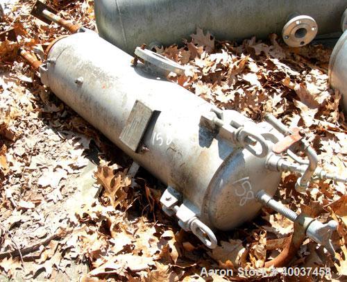 Used Filterite cartridge filter, model 36MS03-316-3FD-C150, stainless steel. 12" x 34" straight side. Dished bolt on top, dished bottom. Internal rated 150 psi at 200 deg.f.. 3" inlet/ outlet.