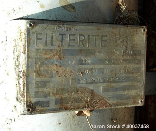 Used Filterite cartridge filter, model 36MS03-316-3FD-C150, stainless steel. 12" x 34" straight side. Dished bolt on top, dished bottom. Internal rated 150 psi at 200 deg.f.. 3" inlet/ outlet.