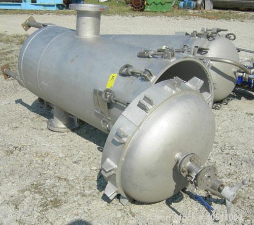 Used Filterite Cartridge Filter, model 935563, type 220MSO4-316L-6FOLD-C150, 316L stainless steel. Approximately 24" diameter x 53" straight side, clamped dished top, dished bottom, rated 150 psi at ...