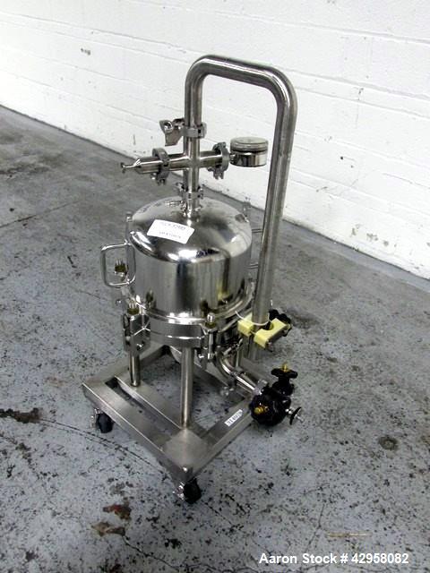 Used- Millipore Filter Housing, Model CES8403. 316L Stainless steel construction, rated 45 psi at 145 degrees C (294 F). 12"...