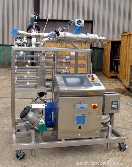 USED: Millipore filtering system consisting of: (1) Isopack biochromatography process column, 316L stainless steel. Approximate 1600mm diameter, rated 58 psi at 86 deg F. (2) Slurry transfer skids co...