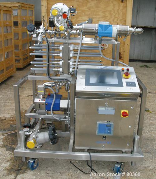 USED: Millipore filtering system consisting of: (1) Isopack biochromatography process column, 316L stainless steel. Approximate 1600mm diameter, rated 58 psi at 86 deg F. (2) Slurry transfer skids co...