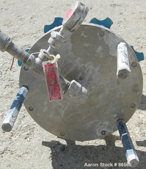 Used Millipore Sterilizing/Pancake Type Filter, 293 MM Diameter, 304 Stainless Steel. Filter area 518 cubic CM, max 125 PSI inlet, pre-filter diameter 257 MM. 1" NPT inlet/outlet. Mounted on 3 legs.