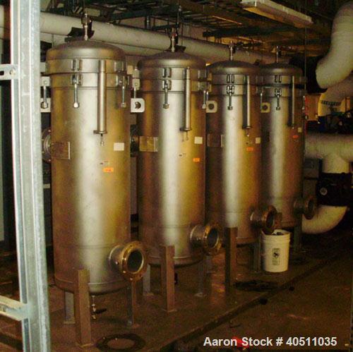 Used 3-L Cartridge Filter, model FWFA-3840-F150, 304 stainless steel. Approximately 24" diameter x 56" straight side, clamped dished top, dished bottom, rated 150 psi at 200 deg F. No cartridge filte...