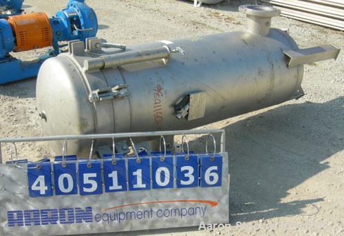 Used 3-L Cartridge Filter, Model FWFA-3840-F150, 304 stainless steel. Approximately 24" diameter x 56" straight side, clamped dished top, dished bottom, rated 150 psi at 200 deg F. No cartridge filte...