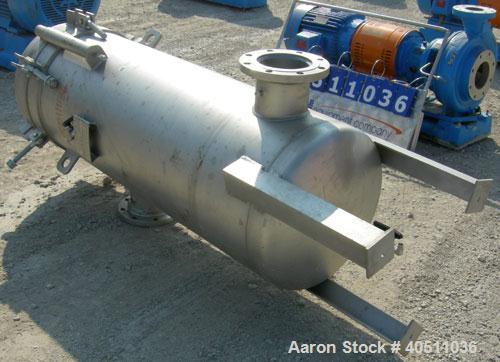 Used 3-L Cartridge Filter, Model FWFA-3840-F150, 304 stainless steel. Approximately 24" diameter x 56" straight side, clamped dished top, dished bottom, rated 150 psi at 200 deg F. No cartridge filte...