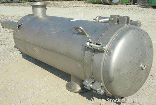 Used 3-L Cartridge Filter, Model FWFA-3840-F150, 304 stainless steel. Approximately 24" diameter x 56" straight side, clamped dished top, dished bottom, rated 150 psi at 200 deg F. No cartridge filte...