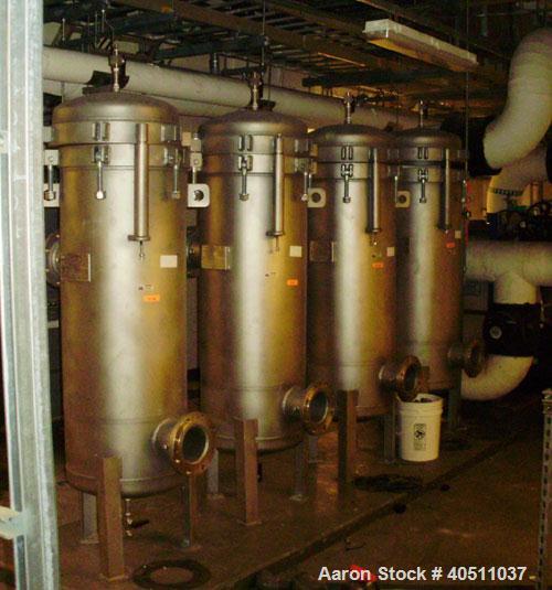 Used 3-L Cartridge Filter, Model FWFA-3840-F150, 304 stainless steel. Approximately 24" diameter x 56" straight side, clamped dished top, dished bottom, rated 150 psi at 200 deg F. No cartridge filte...
