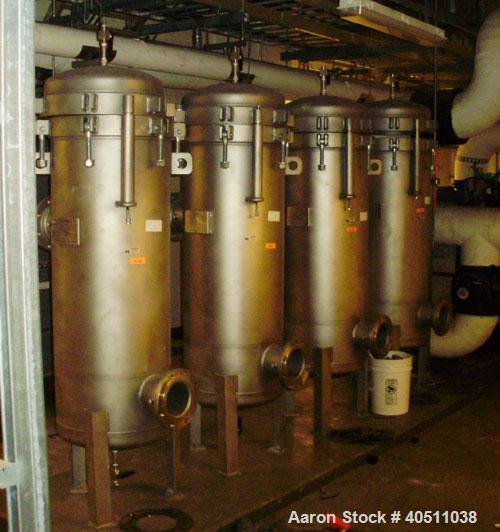 Used 3-L Cartridge Filter, model FWFA-3840-F150, 304 stainless steel. Approximately 24" diameter x 56" straight side, clamped dished top, dished bottom, rated 150 psi at 200 deg F. No cartridge filte...