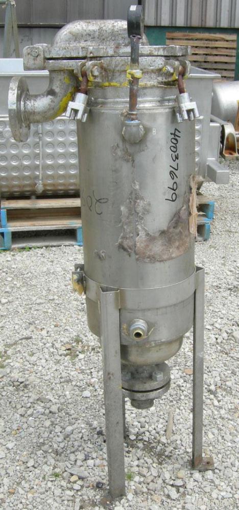 Used Basket Strainer Filter, 316 stainless steel. Jacketed chamber approximately 8" diameter x 29" deep. Flat bolt down top cover. 2" inlet/outlet. Removable basket 7" diameter x 28 1/2" deep.
