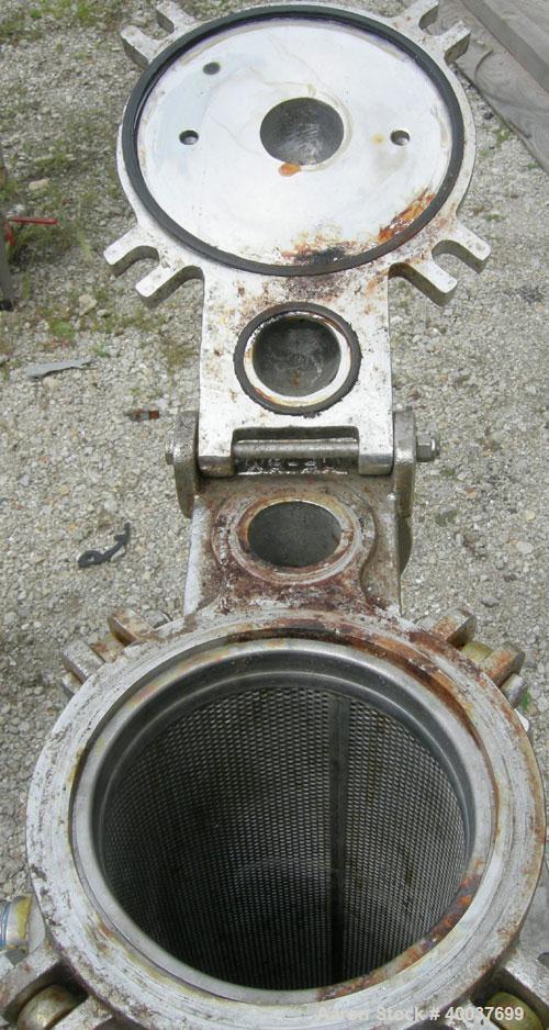 Used Basket Strainer Filter, 316 stainless steel. Jacketed chamber approximately 8" diameter x 29" deep. Flat bolt down top cover. 2" inlet/outlet. Removable basket 7" diameter x 28 1/2" deep.