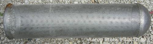 Used- Basket Strainer Filter, 316 stainless steel. Jacketed chamber approximately 8" diameter x 29" deep. Flat bolt down top...