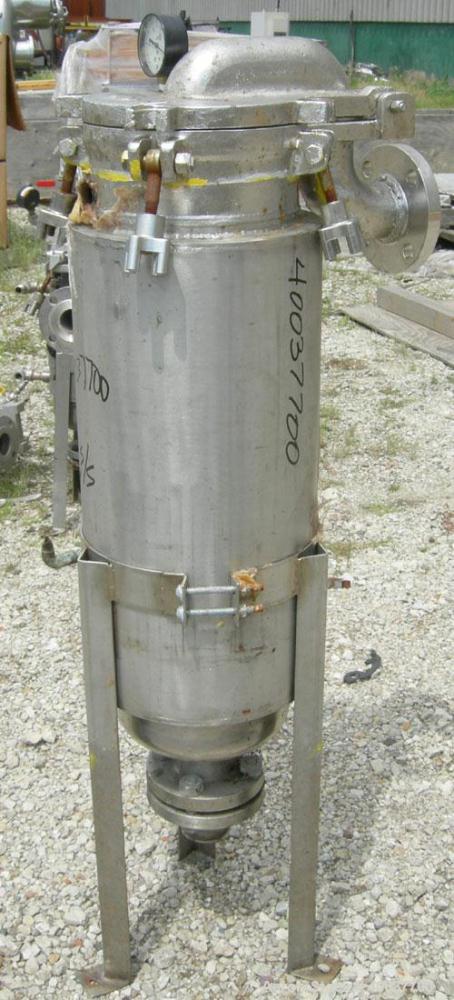Used Basket Strainer Filter, 316 stainless steel. Jacketed chamber approximately 8" diameter x 29" deep. Flat bolt down top cover. 2" inlet/outlet. Removable basket 7" diameter x 28 1/2" deep.