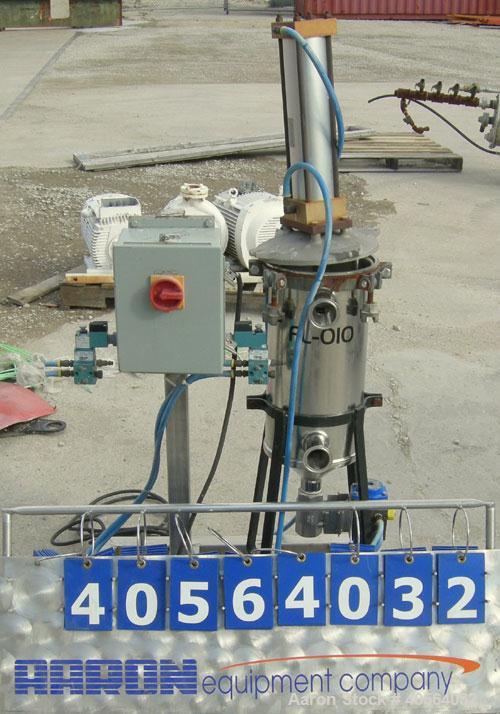 Used Vertical cartridge filter, stainless steel construction, 8 in ID with air cylinder for lid.
