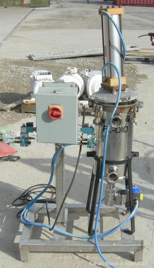Used Vertical cartridge filter, stainless steel construction, 8 in ID with air cylinder for lid.