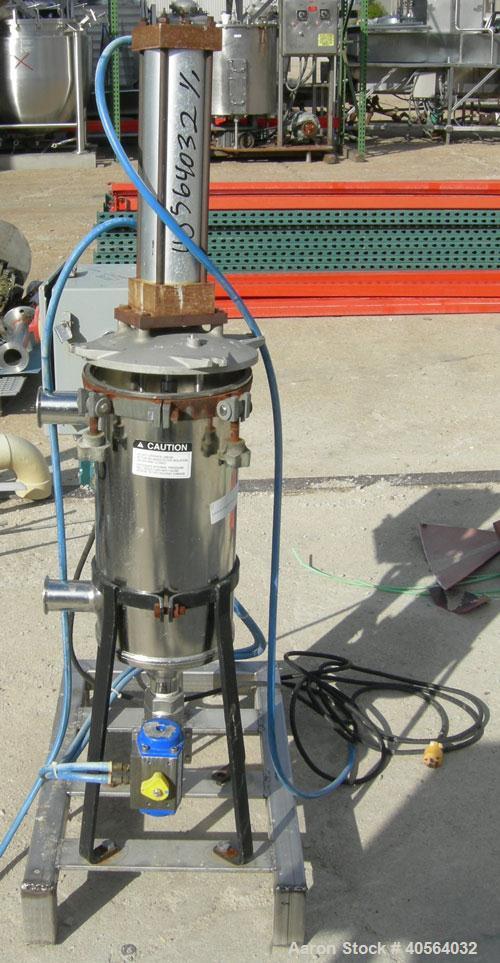Used Vertical cartridge filter, stainless steel construction, 8 in ID with air cylinder for lid.