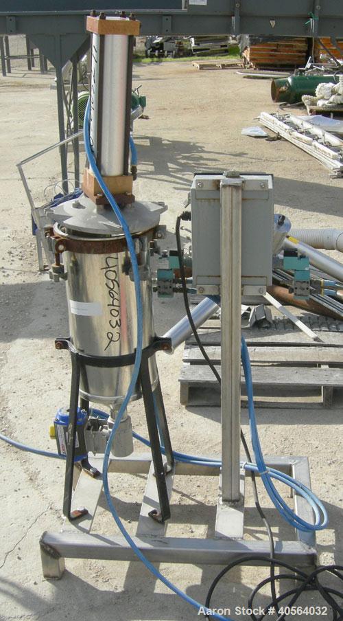 Used Vertical cartridge filter, stainless steel construction, 8 in ID with air cylinder for lid.