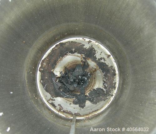 Used Vertical cartridge filter, stainless steel construction, 8 in ID with air cylinder for lid.