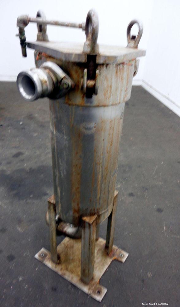 Used- Filtration Filter, 316 Stainless Steel. 9” Diameter 21” long. Approximate 2” inlet/outlet. Screw down top cover. Mount...