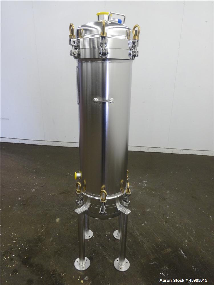 Unused- Pall Filter Housing, Part#4HD4886-2869, 316L Stainless Steel. Approximate 13-3/4" diameter x 46" straight side, dished clamp on top and bottom. Internal rated 100 psi at -20 to 250 degrees F....