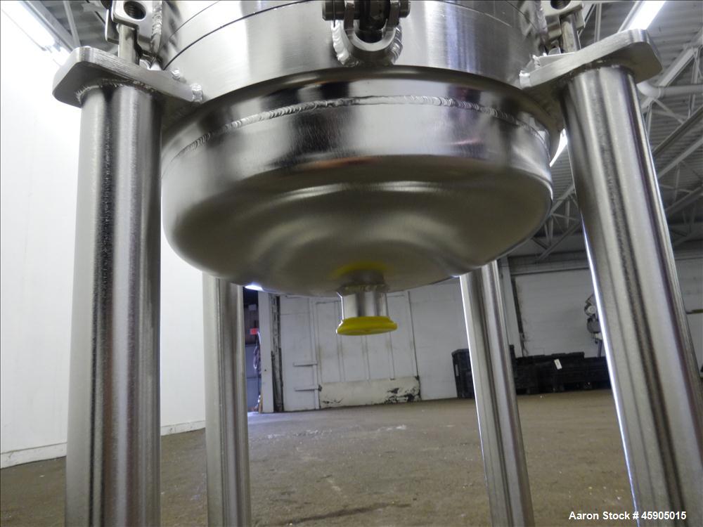 Unused- Pall Filter Housing, Part#4HD4886-2869, 316L Stainless Steel. Approximate 13-3/4" diameter x 46" straight side, dished clamp on top and bottom. Internal rated 100 psi at -20 to 250 degrees F....
