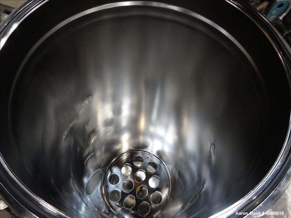 Unused- Pall Filter Housing, Part#4HD4886-2869, 316L Stainless Steel. Approximate 13-3/4" diameter x 46" straight side, dished clamp on top and bottom. Internal rated 100 psi at -20 to 250 degrees F....