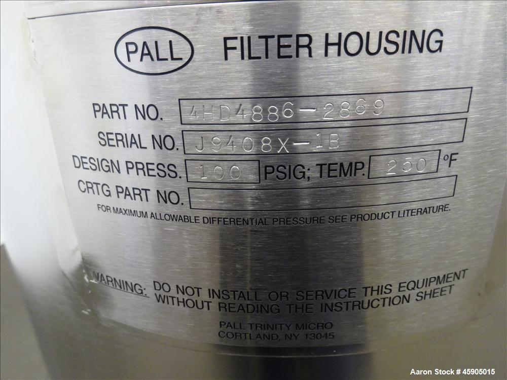 Unused- Pall Filter Housing, Part#4HD4886-2869, 316L Stainless Steel. Approximate 13-3/4" diameter x 46" straight side, dished clamp on top and bottom. Internal rated 100 psi at -20 to 250 degrees F....