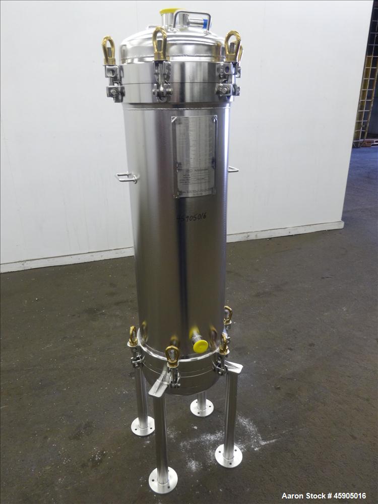 Unused- Pall Filter Housing, Part#4HD4886-2869, 316L Stainless Steel. Approximate 13-3/4" diameter x 46" straight side, dished clamp on top and bottom. Internal rated 100 psi at -20 to 250 degrees F....