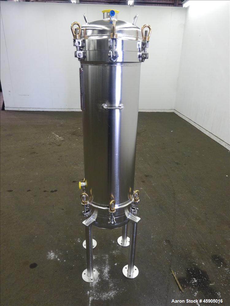 Unused- Pall Filter Housing, Part#4HD4886-2869, 316L Stainless Steel. Approximate 13-3/4" diameter x 46" straight side, dished clamp on top and bottom. Internal rated 100 psi at -20 to 250 degrees F....