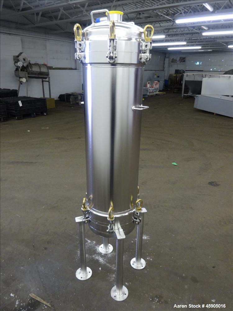 Unused- Pall Filter Housing, Part#4HD4886-2869, 316L Stainless Steel. Approximate 13-3/4" diameter x 46" straight side, dished clamp on top and bottom. Internal rated 100 psi at -20 to 250 degrees F....