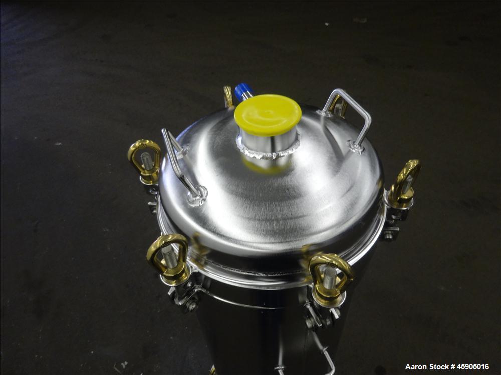 Unused- Pall Filter Housing, Part#4HD4886-2869, 316L Stainless Steel. Approximate 13-3/4" diameter x 46" straight side, dished clamp on top and bottom. Internal rated 100 psi at -20 to 250 degrees F....