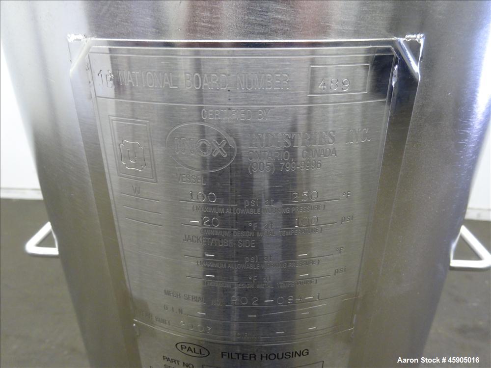 Unused- Pall Filter Housing, Part#4HD4886-2869, 316L Stainless Steel. Approximate 13-3/4" diameter x 46" straight side, dished clamp on top and bottom. Internal rated 100 psi at -20 to 250 degrees F....