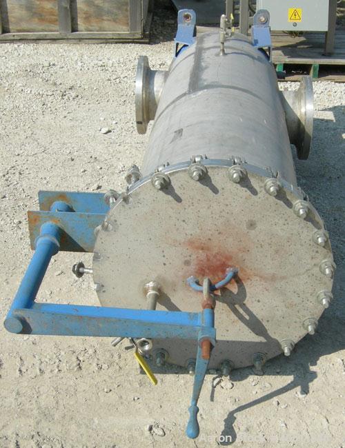 Used Pall Cartridge Filter Housing, part #P384SG29C2H2, 304 stainless steel. Approximately 18'' diameter x 60'' straight side, flat bolt on top, dished bottom. Internal rated 205 psi at 100 deg F, 22...