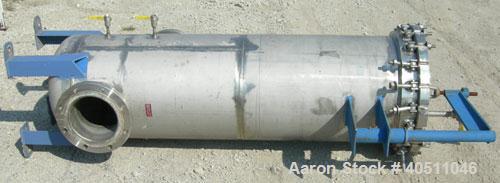 Used Pall Cartridge Filter Housing, part #P384SG29C2H2, 304 stainless steel. Approximately 18'' diameter x 60'' straight side, flat bolt on top, dished bottom. Internal rated 205 psi at 100 deg F, 22...