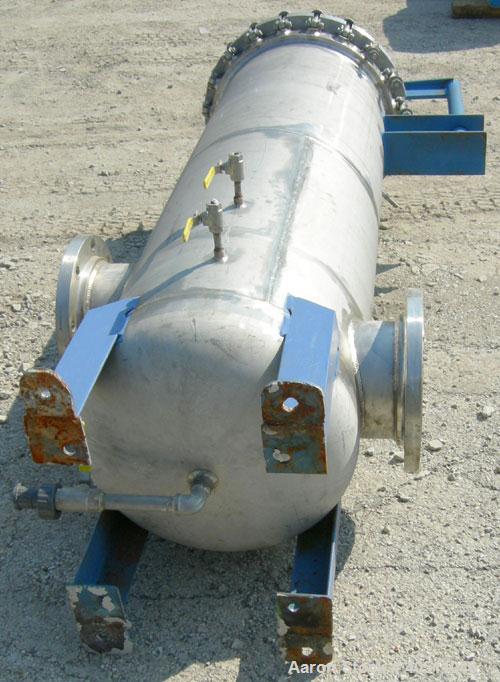 Used Pall Cartridge Filter Housing, part #P384SG29C2H2, 304 stainless steel. Approximately 18'' diameter x 60'' straight side, flat bolt on top, dished bottom. Internal rated 205 psi at 100 deg F, 22...