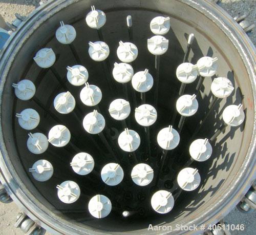 Used Pall Cartridge Filter Housing, part #P384SG29C2H2, 304 stainless steel. Approximately 18'' diameter x 60'' straight side, flat bolt on top, dished bottom. Internal rated 205 psi at 100 deg F, 22...