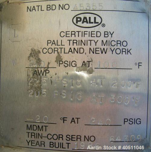 Used Pall Cartridge Filter Housing, part #P384SG29C2H2, 304 stainless steel. Approximately 18'' diameter x 60'' straight side, flat bolt on top, dished bottom. Internal rated 205 psi at 100 deg F, 22...