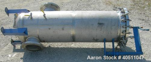 Used Pall Cartridge Filter Housing, part #P384SG29C2H2, 304 stainless steel. Approximately 18'' diameter x 60'' straight side, flat bolt on top, dished bottom. Internal rated 205 psi at 100 deg F, 22...