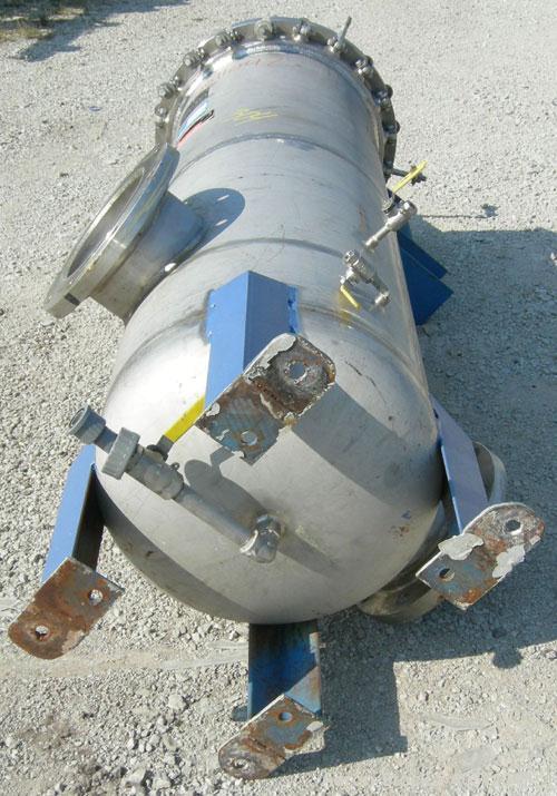 Used Pall Cartridge Filter Housing, part #P384SG29C2H2, 304 stainless steel. Approximately 18'' diameter x 60'' straight side, flat bolt on top, dished bottom. Internal rated 205 psi at 100 deg F, 22...
