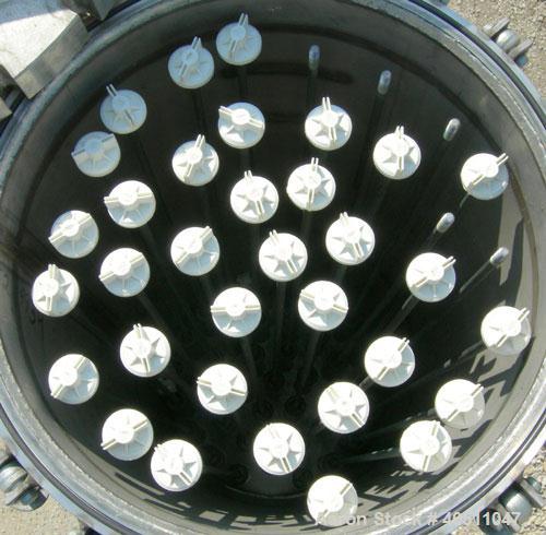 Used Pall Cartridge Filter Housing, part #P384SG29C2H2, 304 stainless steel. Approximately 18'' diameter x 60'' straight side, flat bolt on top, dished bottom. Internal rated 205 psi at 100 deg F, 22...