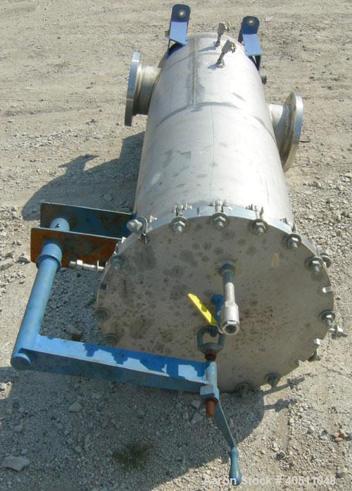 Used Pall Cartridge Filter Housing, part #P384SG29C2H2, 304 stainless steel. Approximately 18'' diameter x 60'' straight side, flat bolt on top, dished bottom. Internal rated 205 psi at 100 deg F, 22...